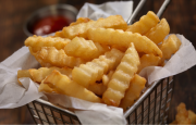 crinkle cut potato fries in basket