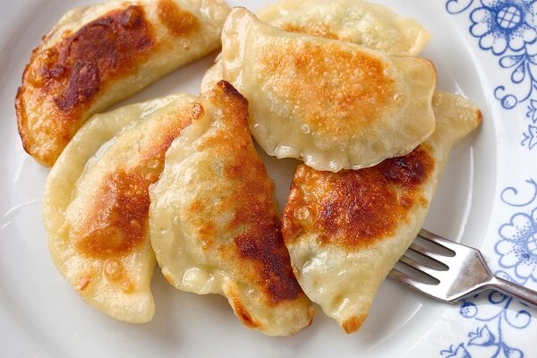 pierogies on plate with fork