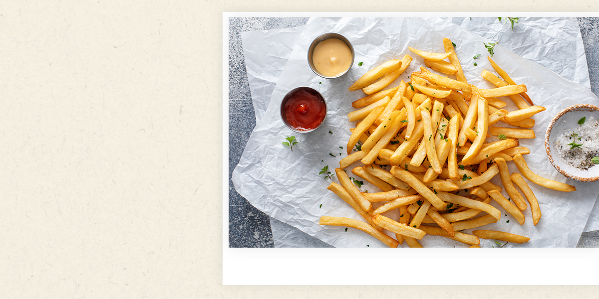 delicious french fries with seasoning